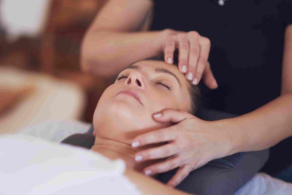 woman getting aroma facial massage